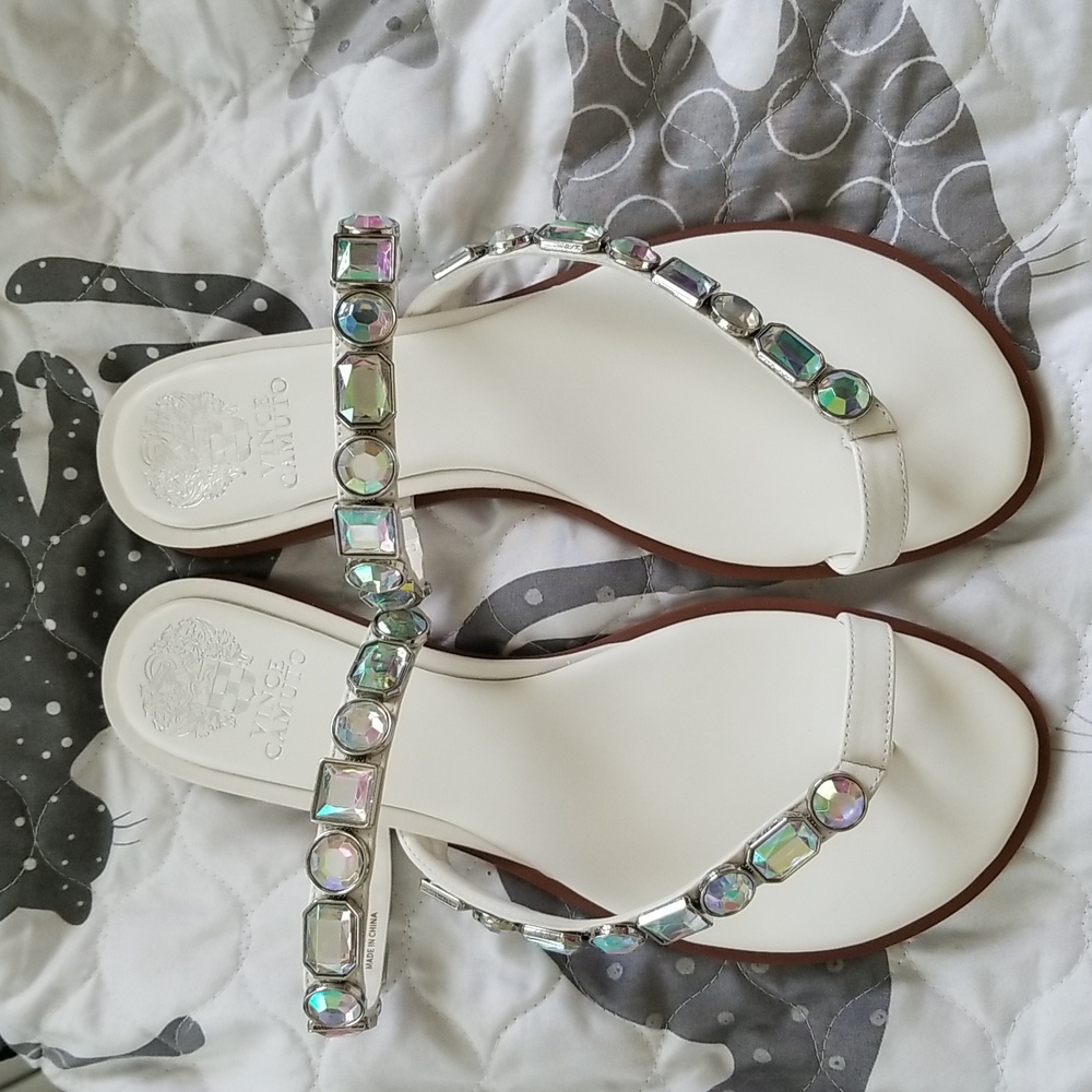 White sandals with large rhinestones